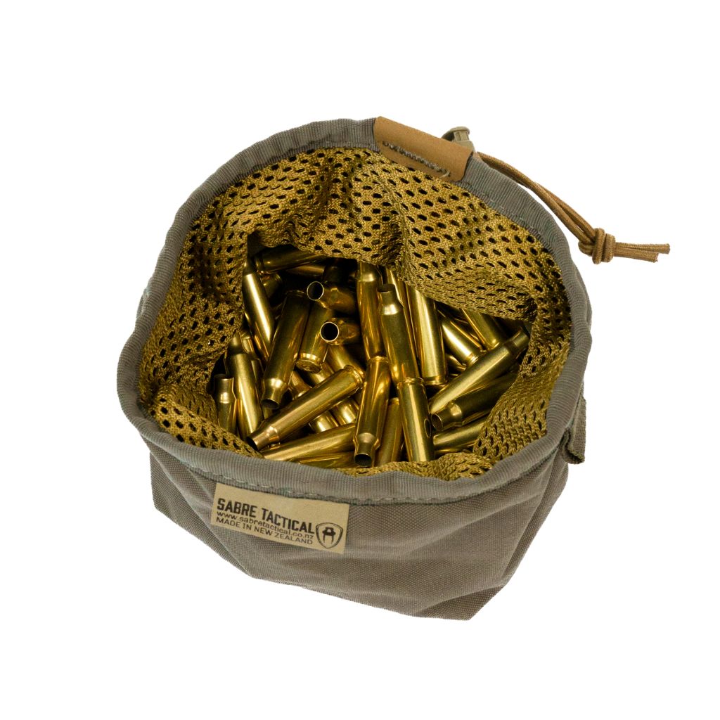 A ranger green brass bag with a flat bottom and an elasticated pull tab to close, designed to hold used brass cases, displayed with brass cases inside it.