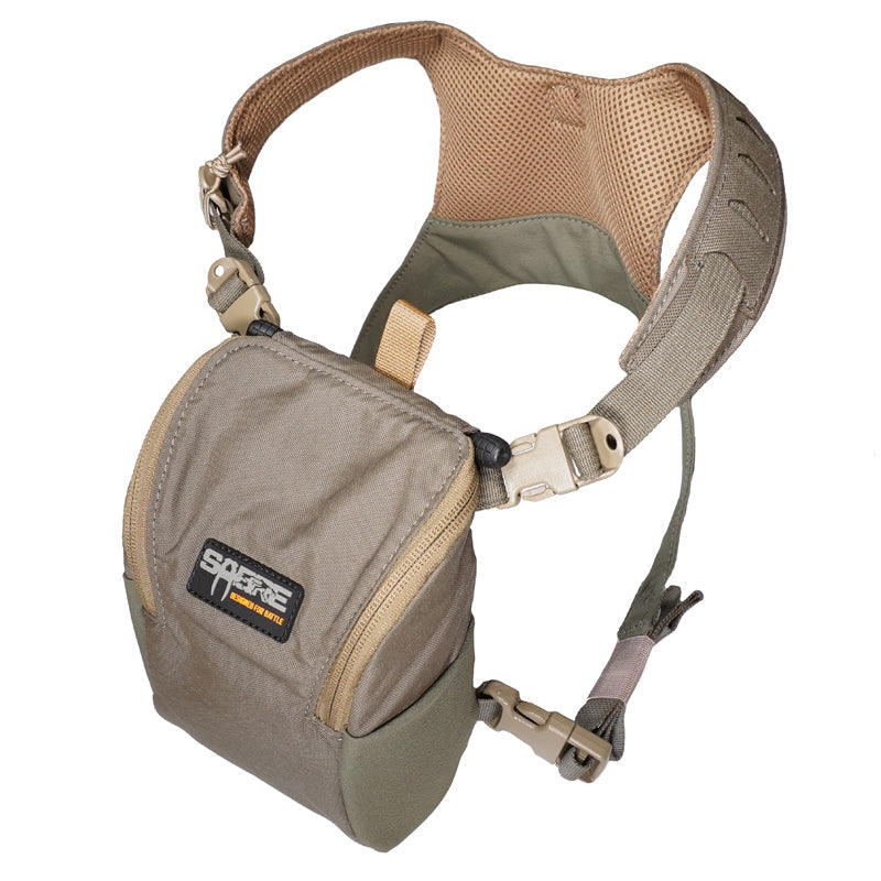 A ranger green Sabre Bino Harness designed to hold binoculars, featuring adjustable straps and a chest rig style design.