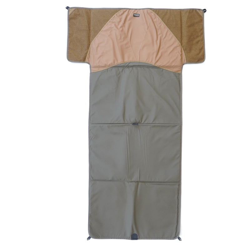 A foldable shooting mat, featuring padding for comfort, a non-slip fabric section and extendable Velcro panels for attaching gear.